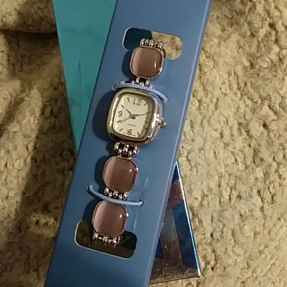 Avon birthstone cats Link watch